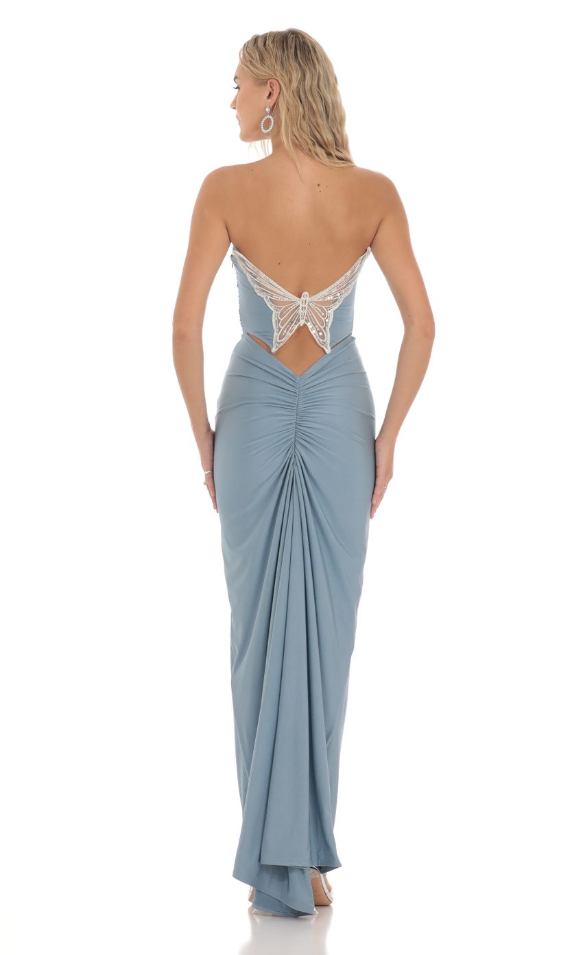 Picture Strapless Corset Sequin Butterfly Maxi Dress in Blue. Source: https://media-img.lucyinthesky.com/data/Feb24/850xAUTO/95e1e2bb-816c-47ee-ba82-fe4f59c9fe3b.jpg