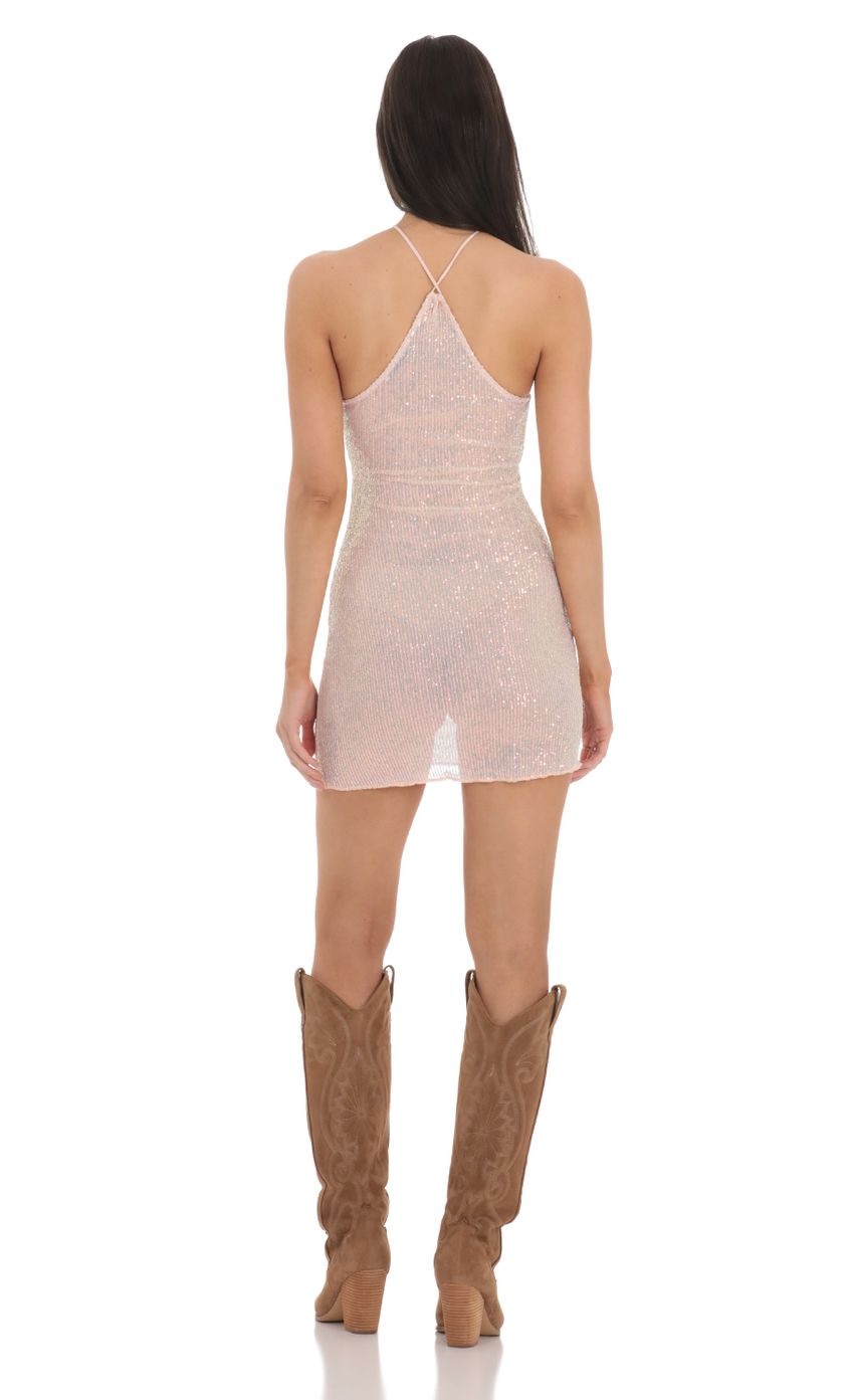 Picture Sequin Halter Cutout Dress in Peach. Source: https://media-img.lucyinthesky.com/data/Feb24/850xAUTO/a5a90549-0c7f-4683-a210-c4665915a7d6.jpg