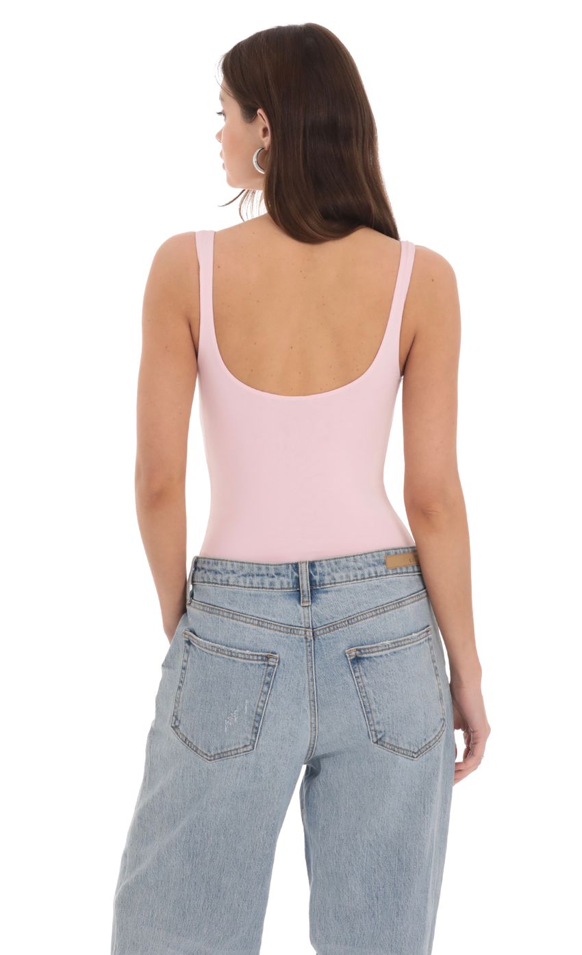 Picture Basic Tank Bodysuit in Pink. Source: https://media-img.lucyinthesky.com/data/Feb24/850xAUTO/a8bbdc81-43c4-44bb-9940-e500f3d7f4dd.jpg