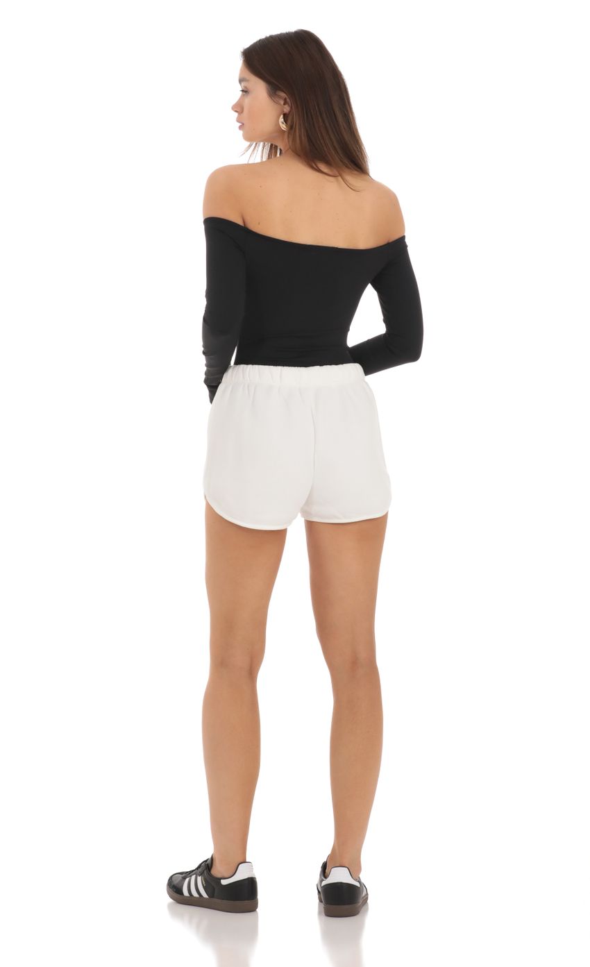 Picture Dolphin Fleece Shorts in White. Source: https://media-img.lucyinthesky.com/data/Feb24/850xAUTO/a938759e-b9c6-4a9d-bcf6-13fbac76fd37.jpg