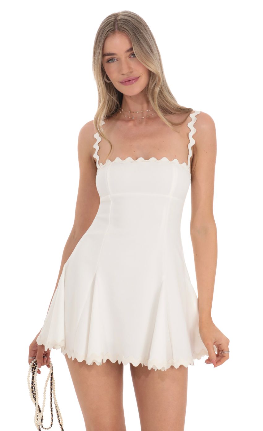 Picture Wavy Fit and Flare Dress in White. Source: https://media-img.lucyinthesky.com/data/Feb24/850xAUTO/b50a8472-7146-414c-b07f-a0ea51ec269d.jpg