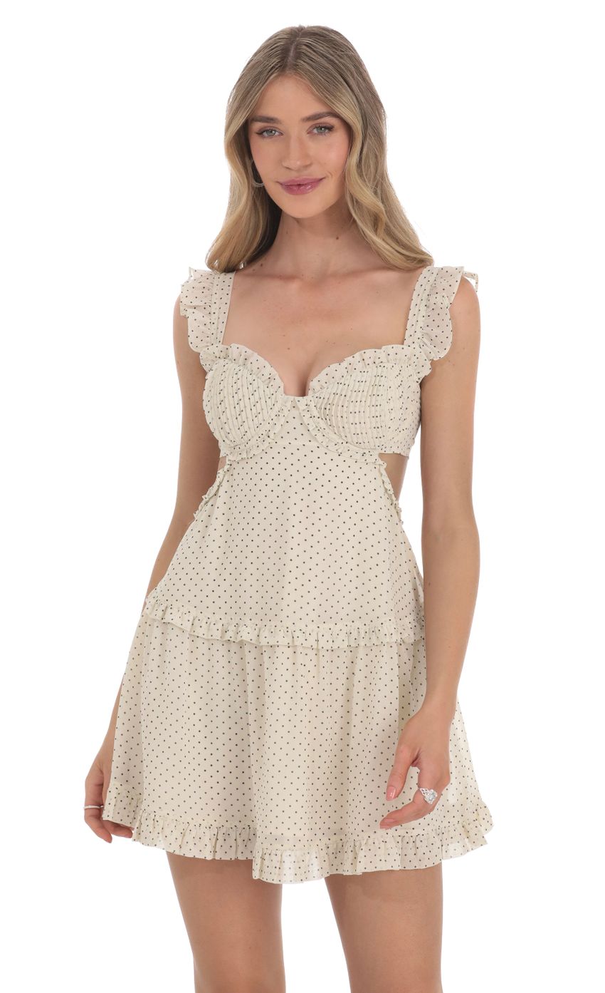 Picture Polka Dot Cutout Dress in Cream. Source: https://media-img.lucyinthesky.com/data/Feb24/850xAUTO/b96877ef-0a18-4acf-a336-646d5180fc75.jpg