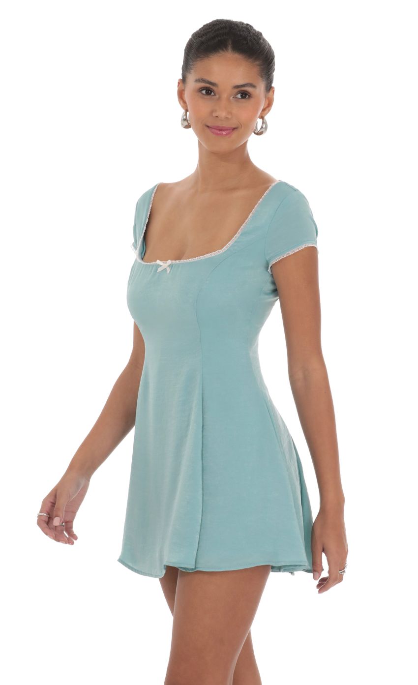 Picture Satin Short Sleeve A-line Dress in Aqua Blue. Source: https://media-img.lucyinthesky.com/data/Feb24/850xAUTO/bc4159f3-d94b-4e0f-8950-2276a61dce6a.jpg