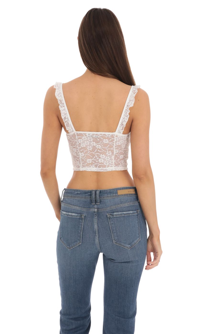 Picture Floral Lace Top in White. Source: https://media-img.lucyinthesky.com/data/Feb24/850xAUTO/bd39f1f1-722e-4835-8c84-5dcedadd6fdc.jpg