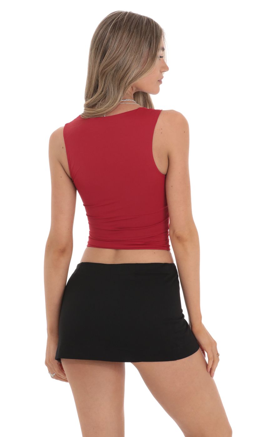 Picture Scoop Neck Tank Top in Red. Source: https://media-img.lucyinthesky.com/data/Feb24/850xAUTO/bf3baac6-0942-4de7-a8ba-c96f95c62d83.jpg