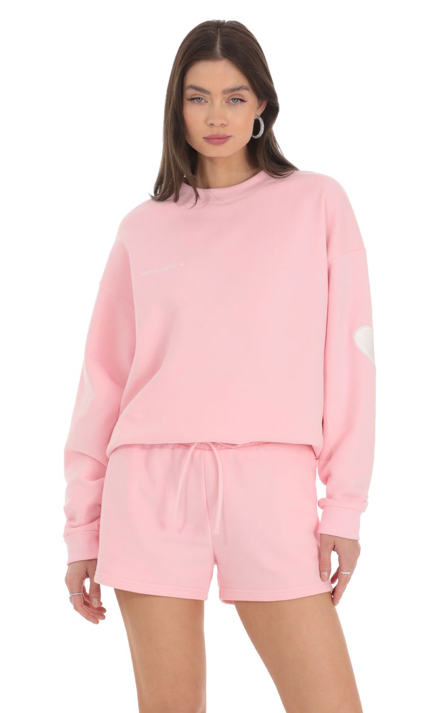 Picture Embroidered Lucy in the Sky Jumper in Pink. Source: https://media-img.lucyinthesky.com/data/Feb24/850xAUTO/cc92d88f-c46e-4281-8c9d-8653e8fb168b.jpg