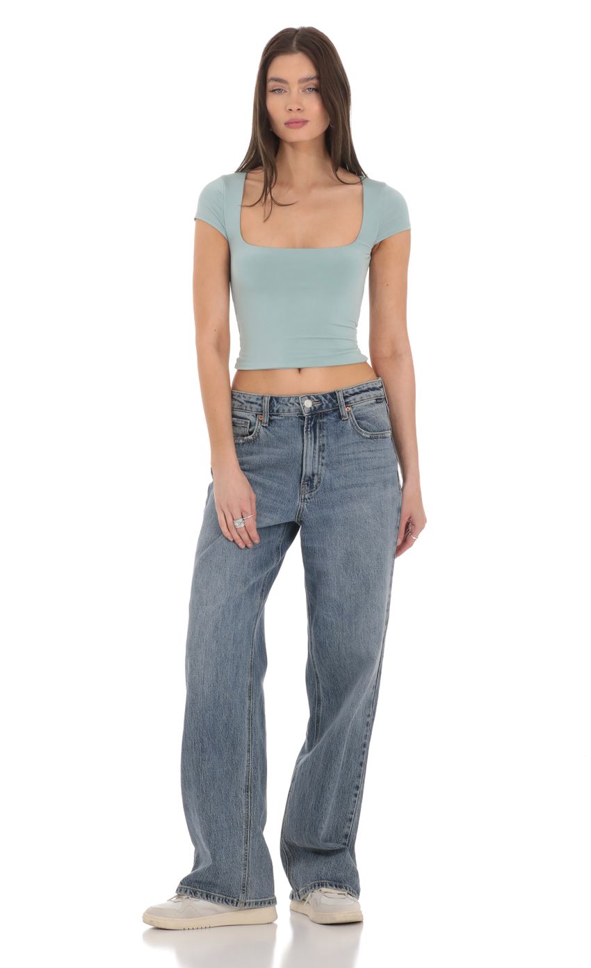 Picture Short Sleeve Crop Top in Seaglass Blue. Source: https://media-img.lucyinthesky.com/data/Feb24/850xAUTO/cf42a1be-753a-45df-97fe-ac6dd070bb48.jpg