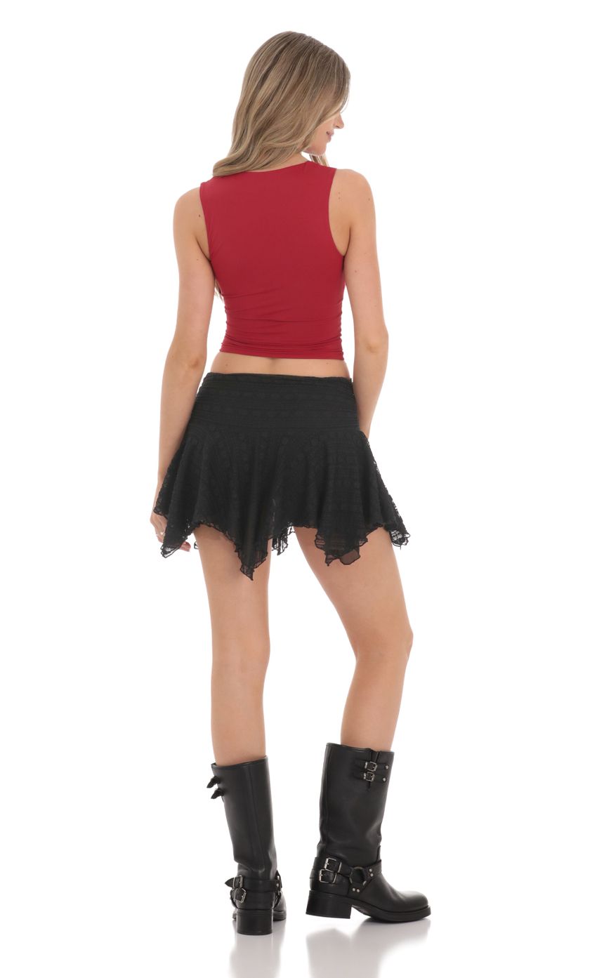 Picture Textured Asymmetrical Skirt in Black. Source: https://media-img.lucyinthesky.com/data/Feb24/850xAUTO/d0984b04-26eb-4d36-82a2-a0079542240d.jpg