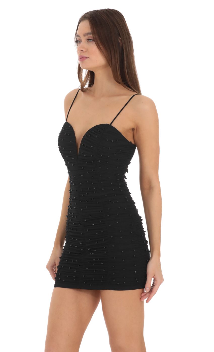 Picture Mesh Ruched Pearl Dress in Black. Source: https://media-img.lucyinthesky.com/data/Feb24/850xAUTO/d757d4dc-7fd3-4477-acfe-56002c3abf4f.jpg