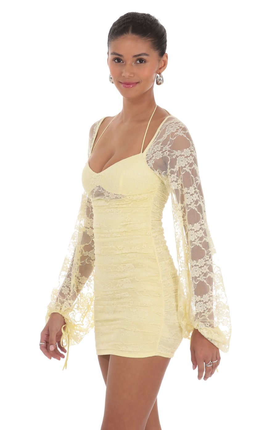 Picture Lace Ruched Long Sleeve Dress in Yellow. Source: https://media-img.lucyinthesky.com/data/Feb24/850xAUTO/e6a07ad8-4eba-4b75-8ffd-ff6f8b0ca568.jpg