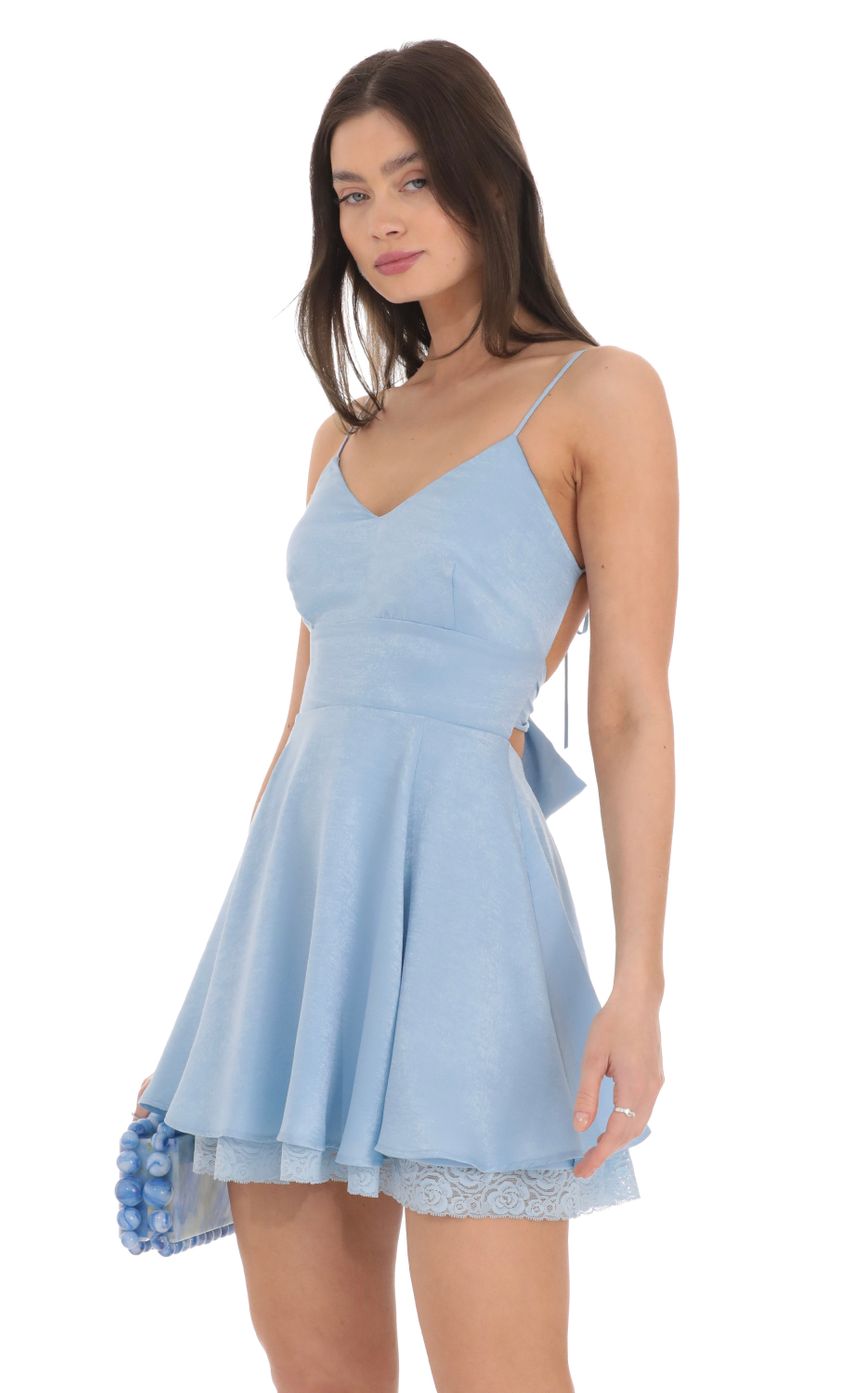 Picture Lace Hem Satin Fit and Flare Dress in Blue. Source: https://media-img.lucyinthesky.com/data/Feb24/850xAUTO/edced9d9-950b-490e-9953-e49f92d72651.jpg