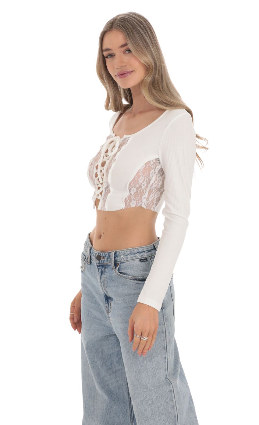 Picture Ribbed Lace Long Sleeve Top in White. Source: https://media-img.lucyinthesky.com/data/Feb24/850xAUTO/efa7aa72-dc05-4032-9265-6e4ca4b06586.jpg