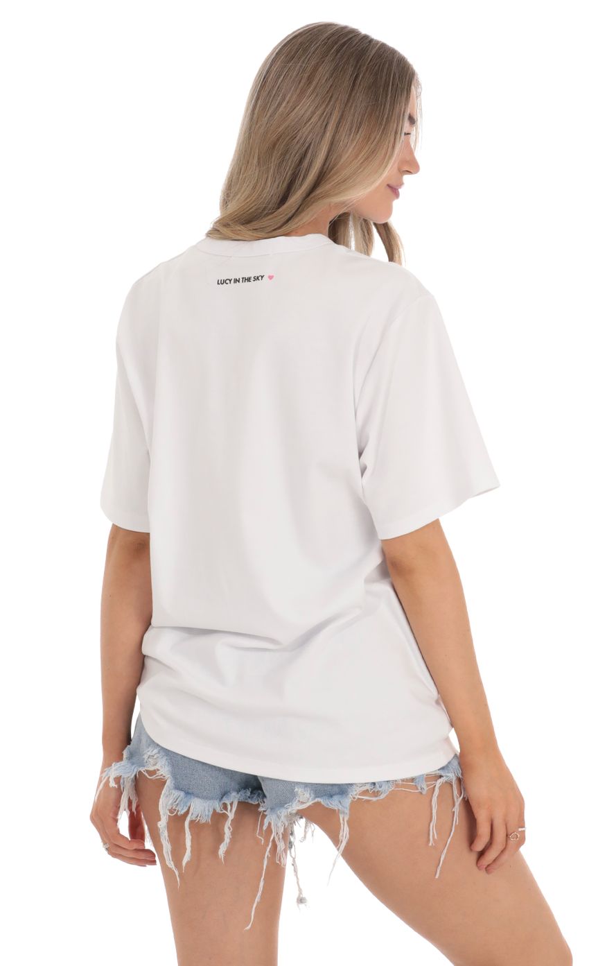 Picture Beverly Hills California Graphic T-Shirt in White. Source: https://media-img.lucyinthesky.com/data/Feb24/850xAUTO/f5233db1-5446-46bd-a91c-7f97c9c3dc84.jpg
