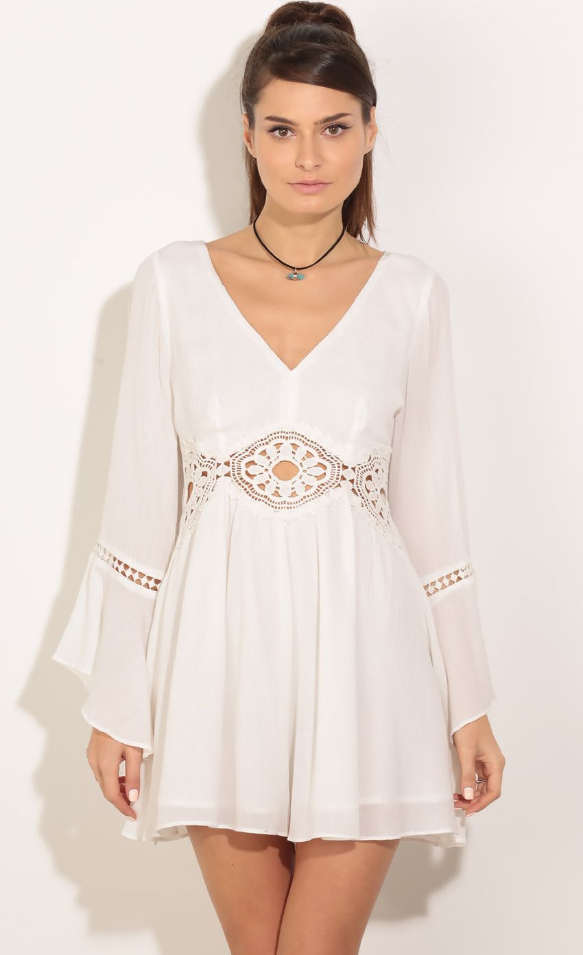 Picture Bell Sleeve Crochet Playsuit In White. Source: https://media-img.lucyinthesky.com/data/Jan16_1/850xAUTO/0Y5A4097.JPG