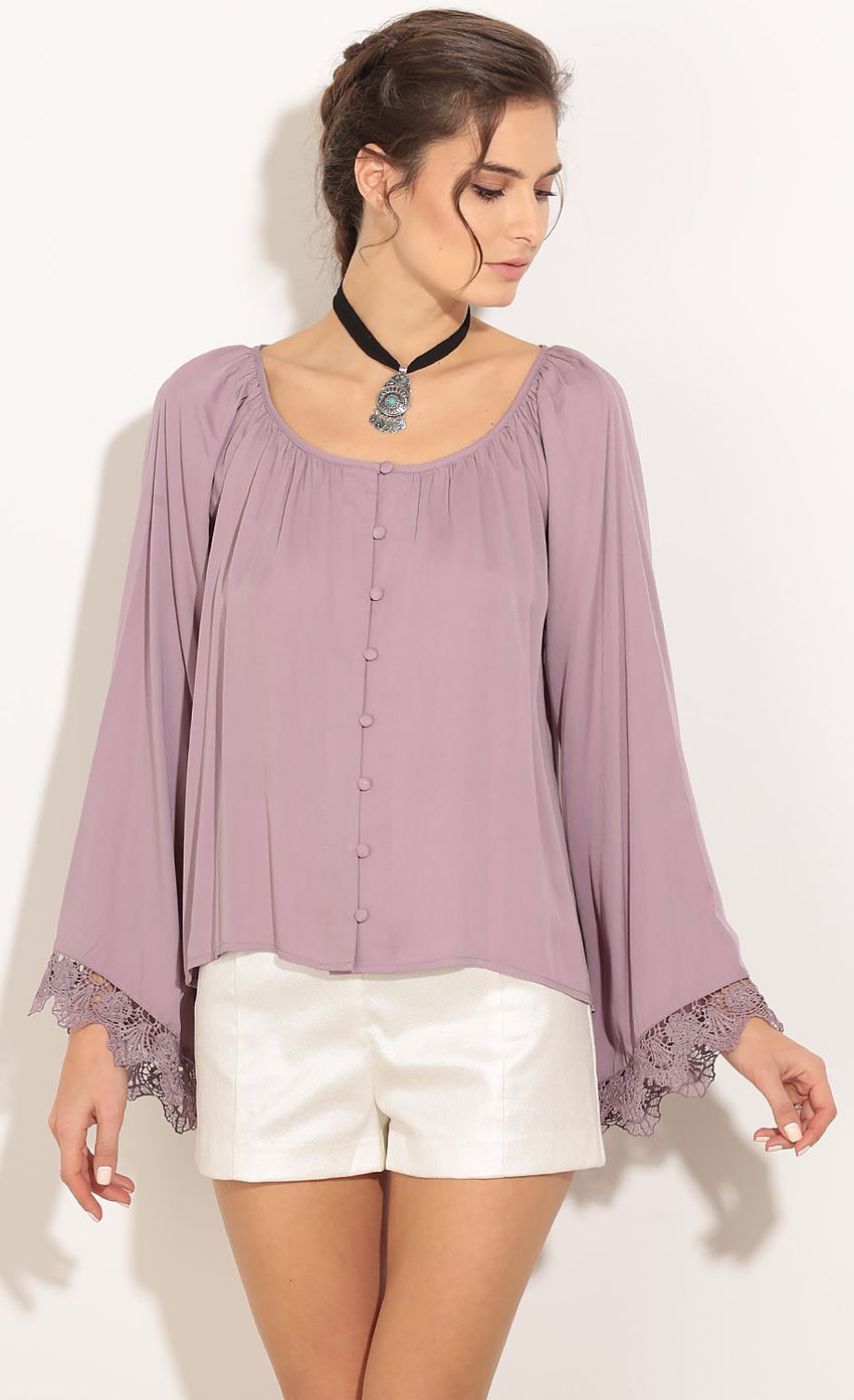 Picture Button Bell Sleeve Top In Purple. Source: https://media-img.lucyinthesky.com/data/Jan16_1/850xAUTO/0Y5A6513.JPG