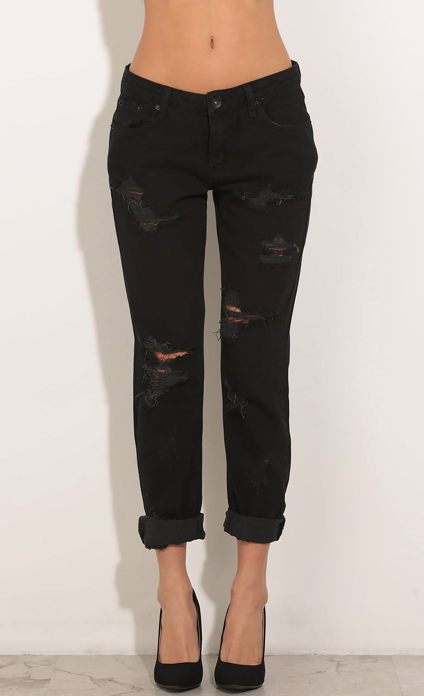 Picture Distressed Jeans In Black. Source: https://media-img.lucyinthesky.com/data/Jan16_2/850xAUTO/0Y5A0181.JPG