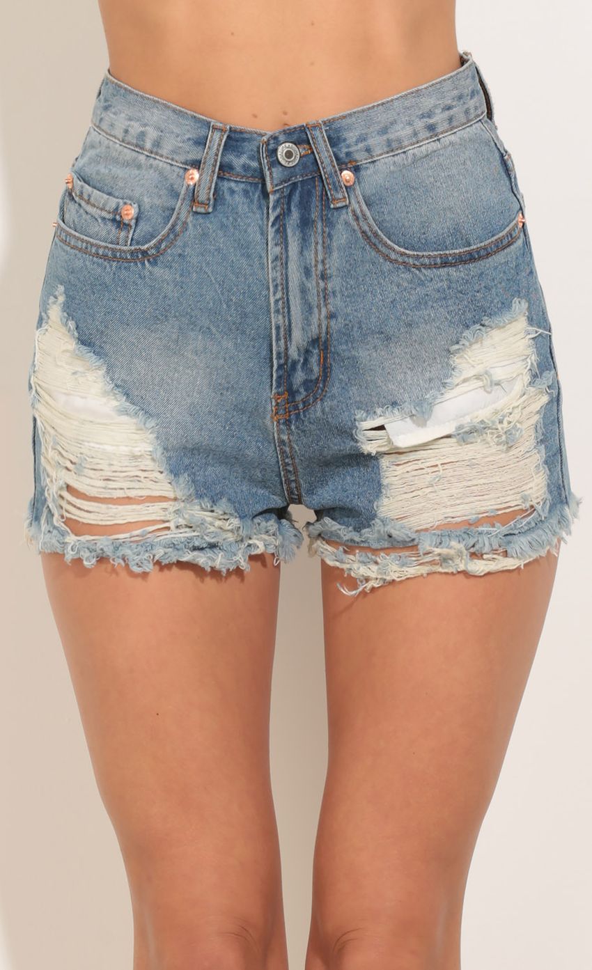 Picture Distressed High Waisted Shorts. Source: https://media-img.lucyinthesky.com/data/Jan16_2/850xAUTO/0Y5A0566.JPG