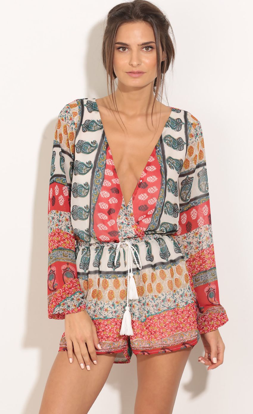 Picture Bohemian Tassel Plunge Romper. Source: https://media-img.lucyinthesky.com/data/Jan16_2/850xAUTO/0Y5A15511.JPG