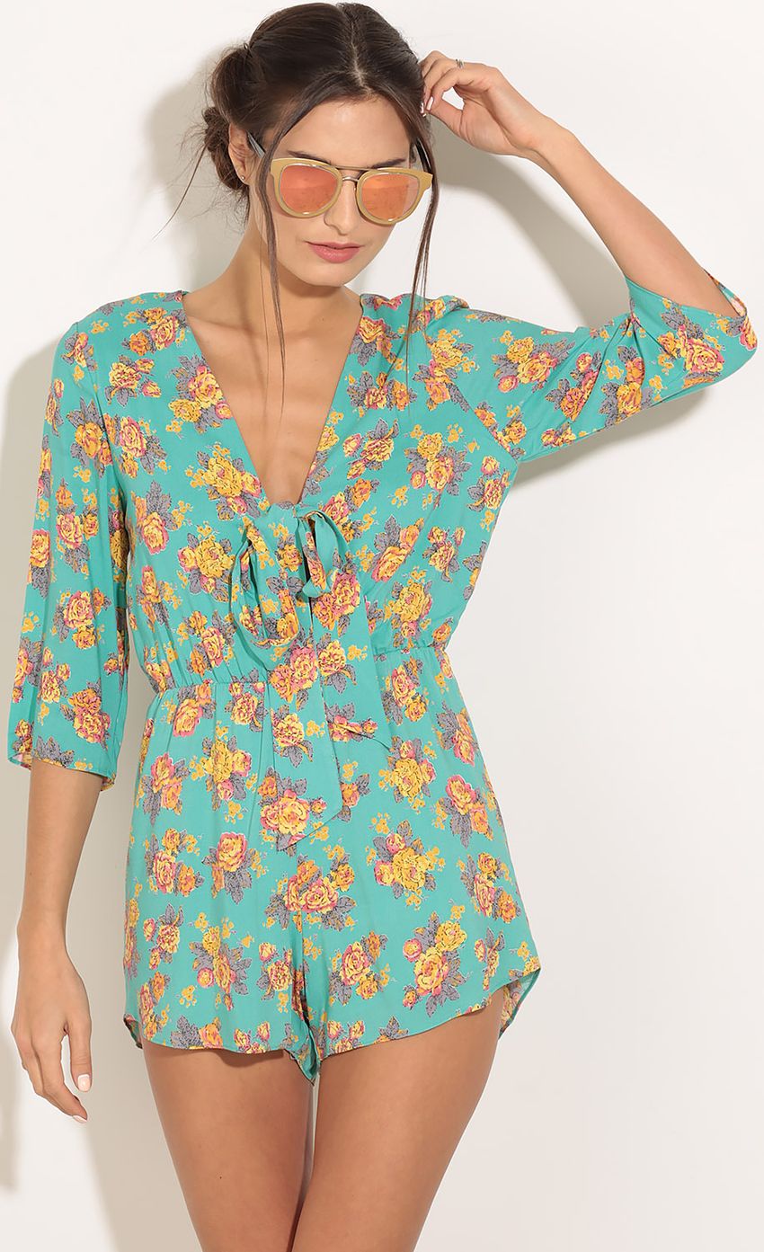 Picture Floral Tie-Up Romper In Teal. Source: https://media-img.lucyinthesky.com/data/Jan16_2/850xAUTO/0Y5A2539.JPG