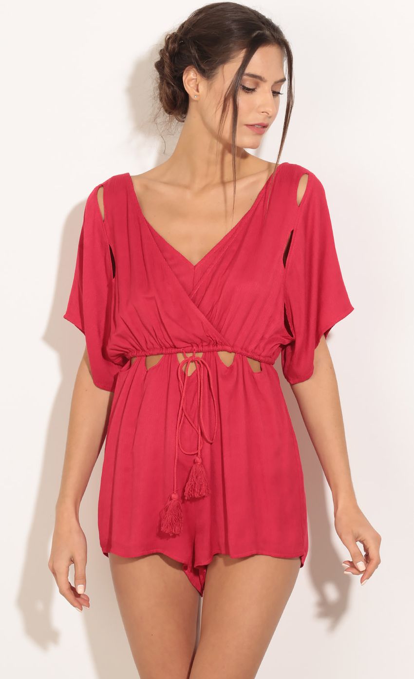 Picture Tassel Peek-A-Boo Romper In Red. Source: https://media-img.lucyinthesky.com/data/Jan16_2/850xAUTO/0Y5A4374.JPG