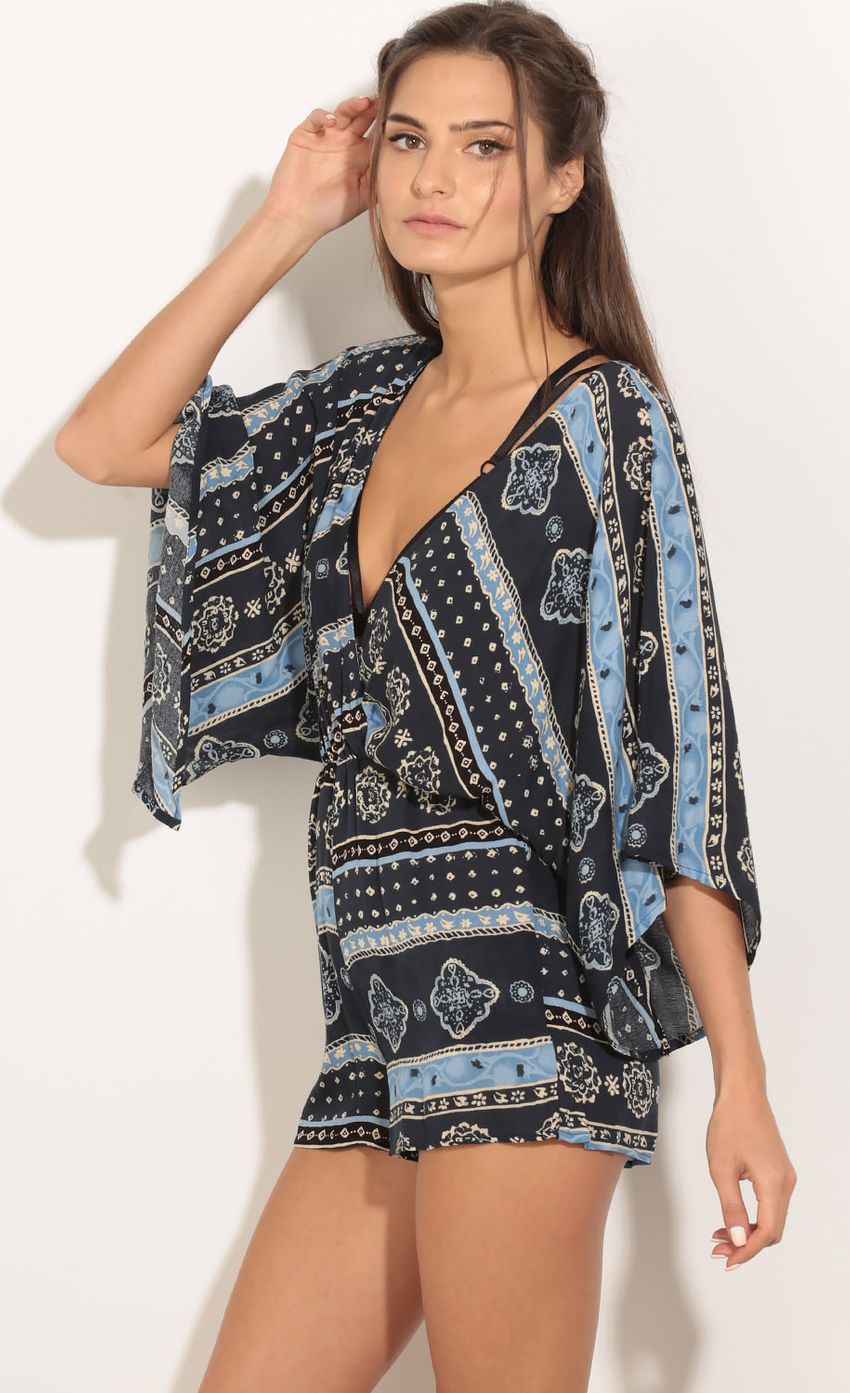 Picture Batwing Wrap Romper In Navy. Source: https://media-img.lucyinthesky.com/data/Jan16_2/850xAUTO/0Y5A5654.JPG