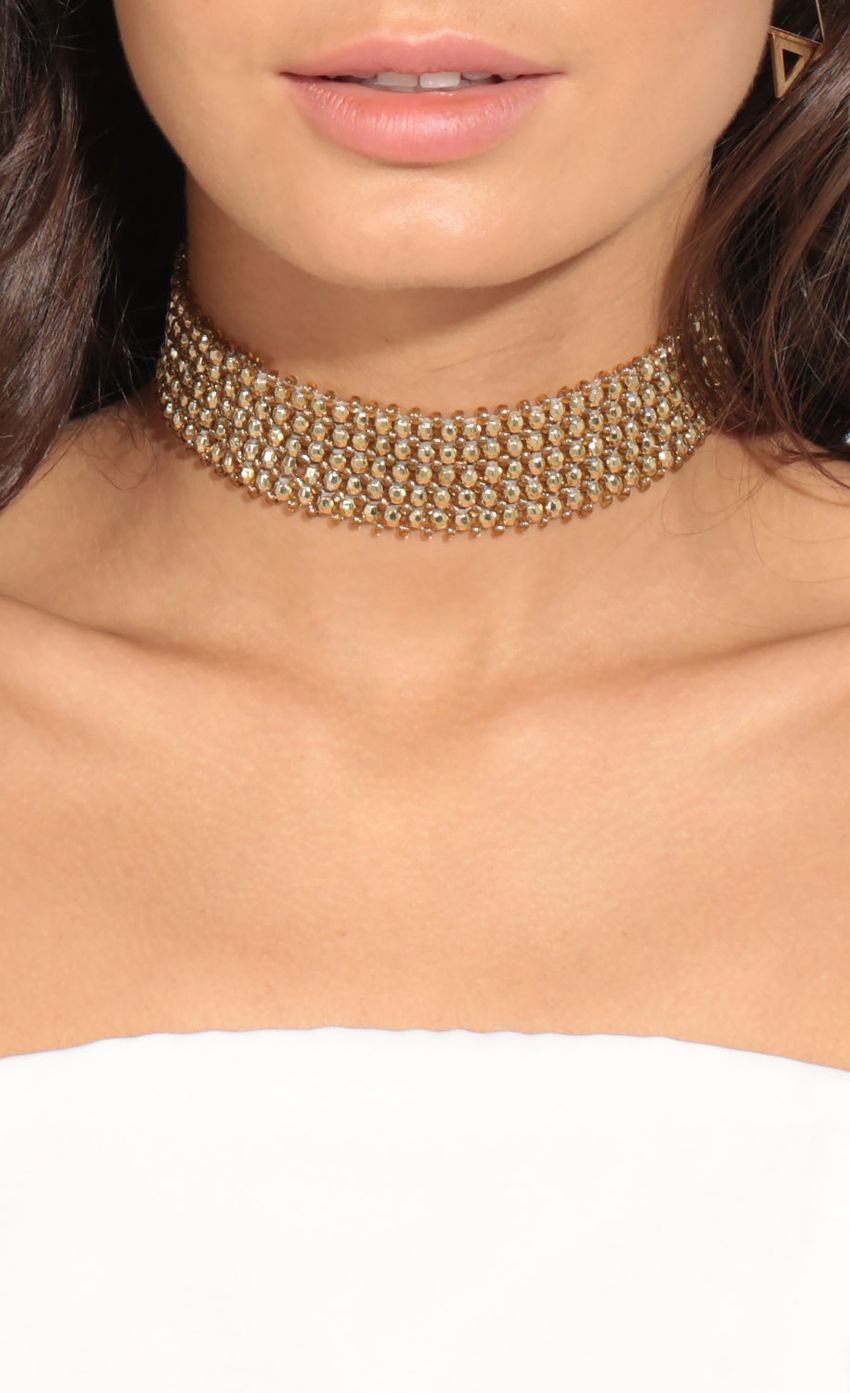 Picture Braided Choker Chain Necklace In Gold. Source: https://media-img.lucyinthesky.com/data/Jan17_1/850xAUTO/0Y5A8677.JPG
