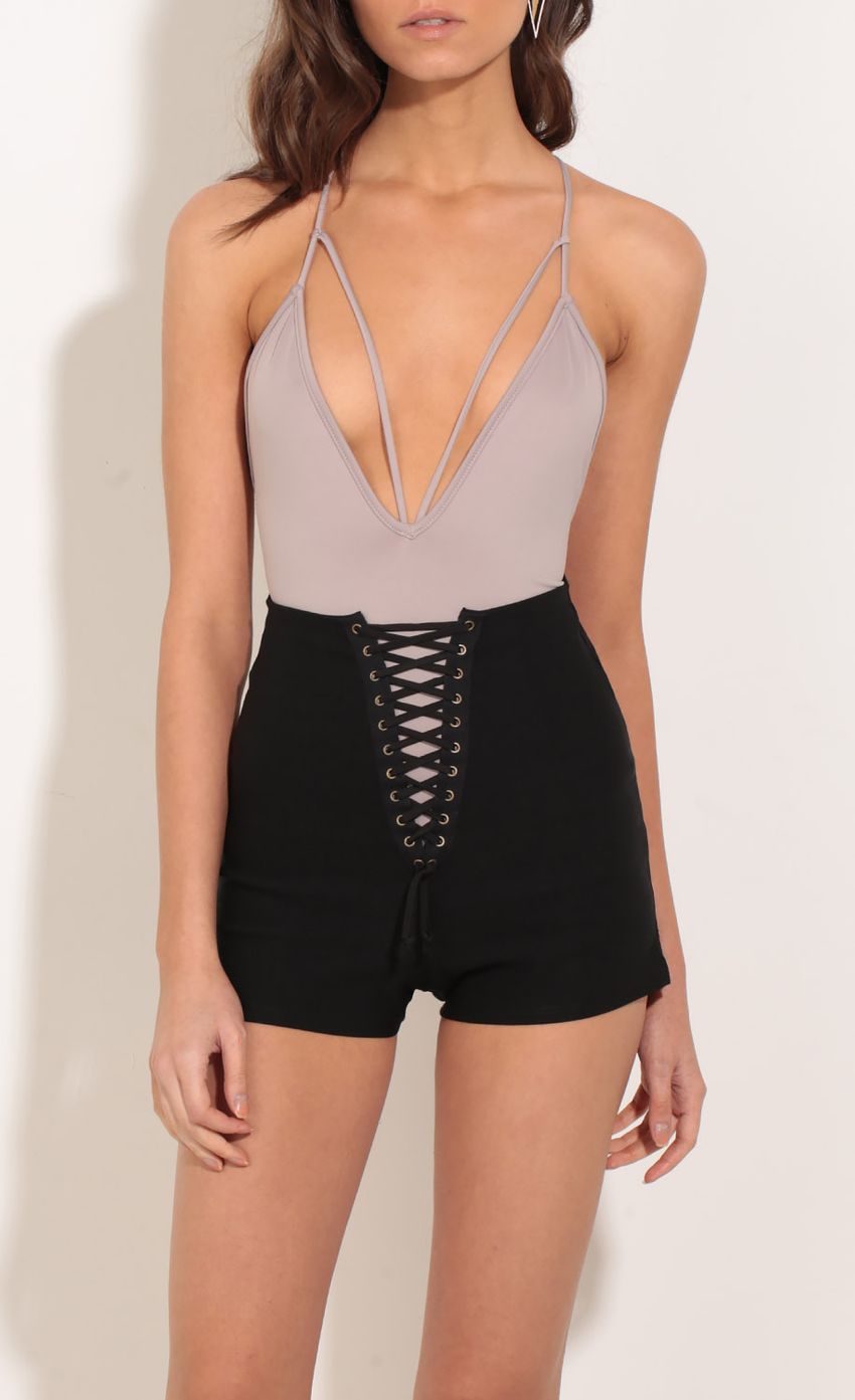 Picture Strappy Bodysuit In Dusty Mauve. Source: https://media-img.lucyinthesky.com/data/Jan17_2/850xAUTO/0Y5A6768.JPG