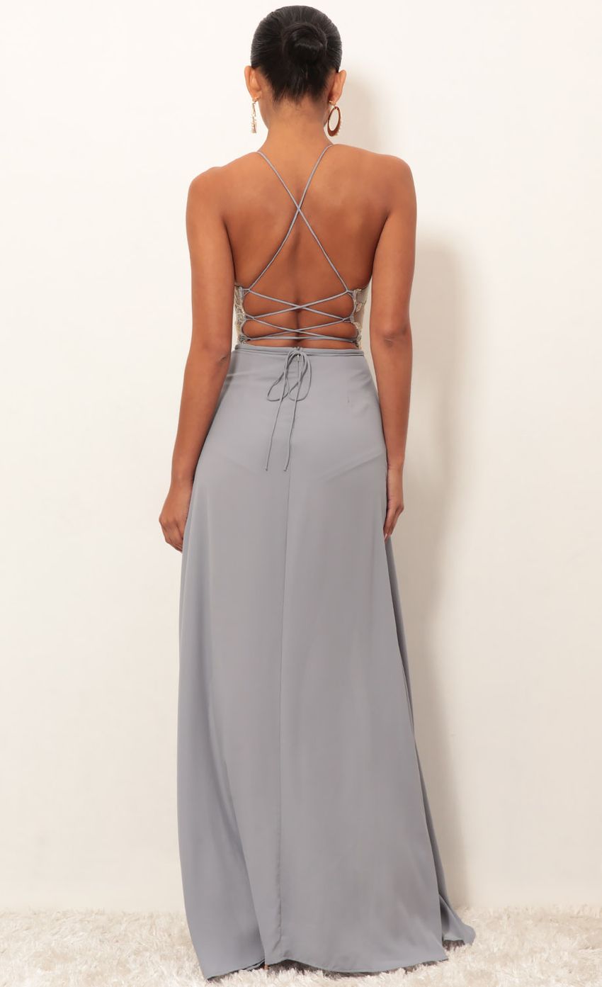 Picture Gold Lace Maxi Dress in Grey. Source: https://media-img.lucyinthesky.com/data/Jan19_2/850xAUTO/0Y5A3188.JPG