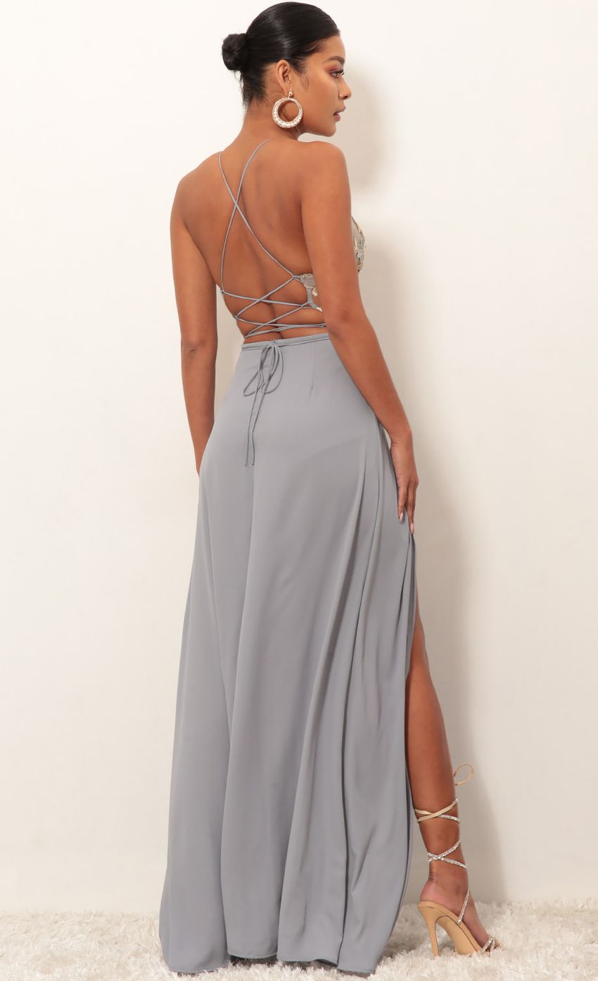 Picture Gold Lace Maxi Dress in Grey. Source: https://media-img.lucyinthesky.com/data/Jan19_2/850xAUTO/0Y5A3192.JPG