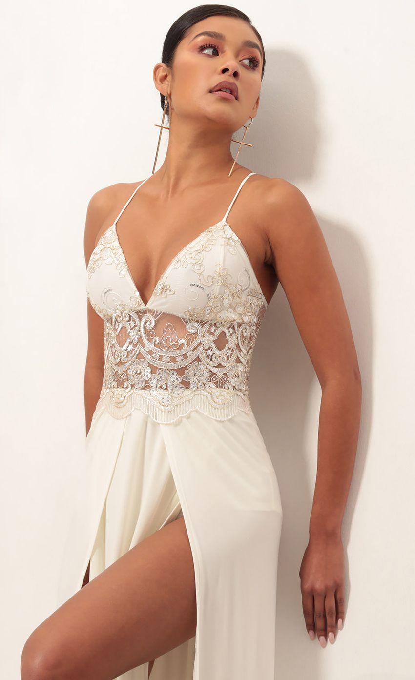 Picture Tulum Lace Maxi Dress in Ivory Gold. Source: https://media-img.lucyinthesky.com/data/Jan19_2/850xAUTO/0Y5A4078S.JPG