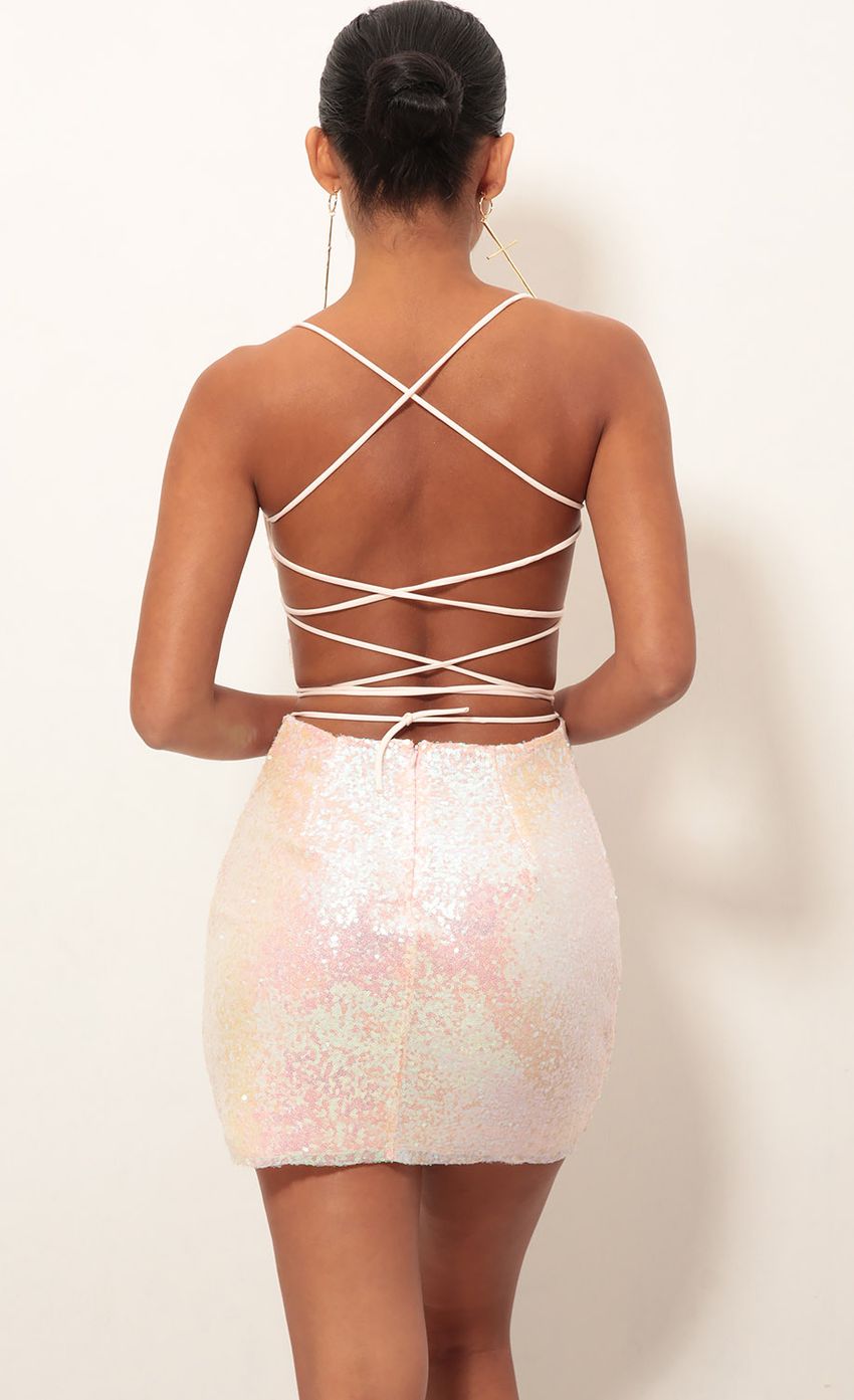 Picture Sequin Dress in Pink Iridescent. Source: https://media-img.lucyinthesky.com/data/Jan19_2/850xAUTO/0Y5A4119.JPG