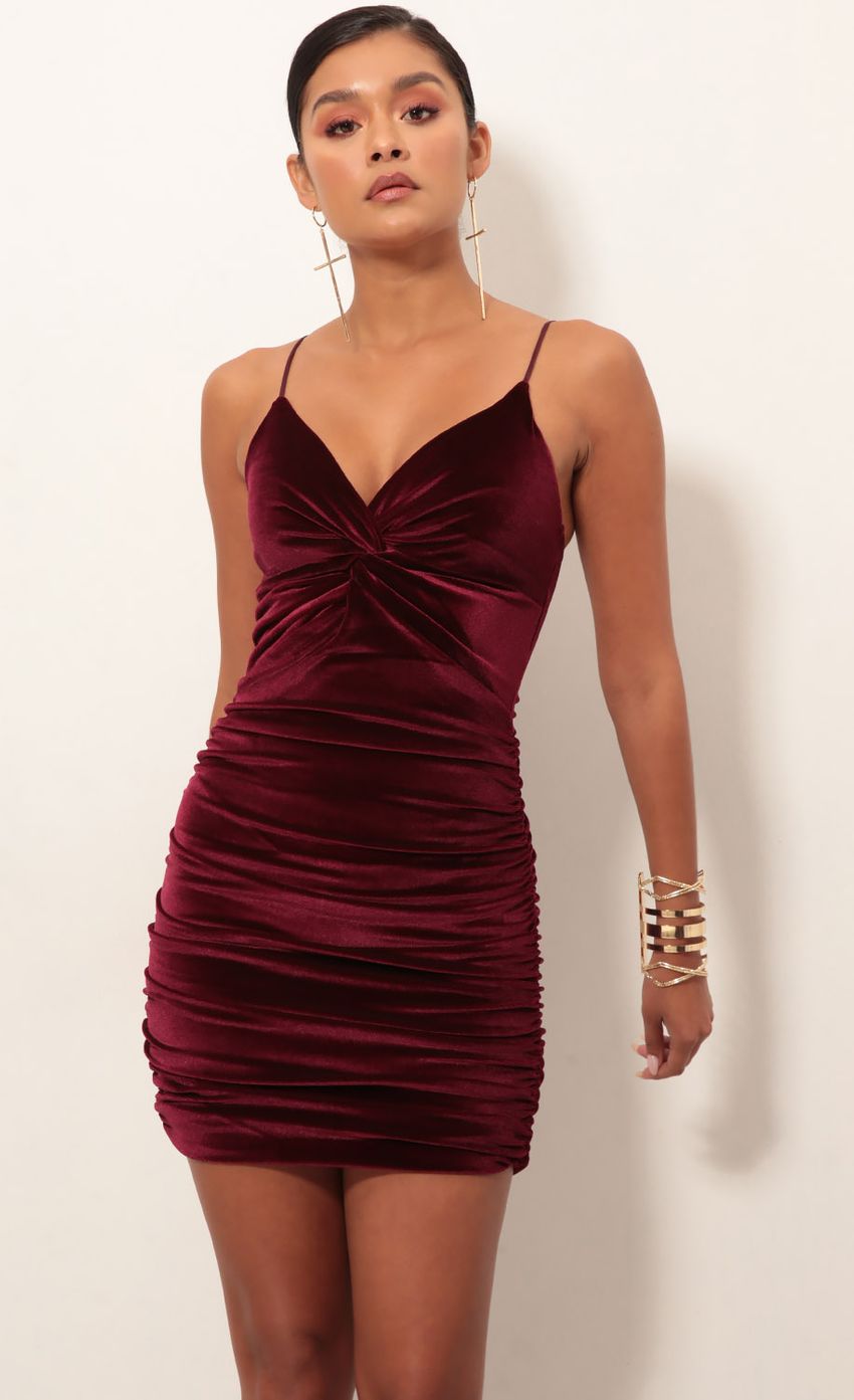 Picture Front Twist Dress in Wine Velvet. Source: https://media-img.lucyinthesky.com/data/Jan19_2/850xAUTO/0Y5A4178.JPG