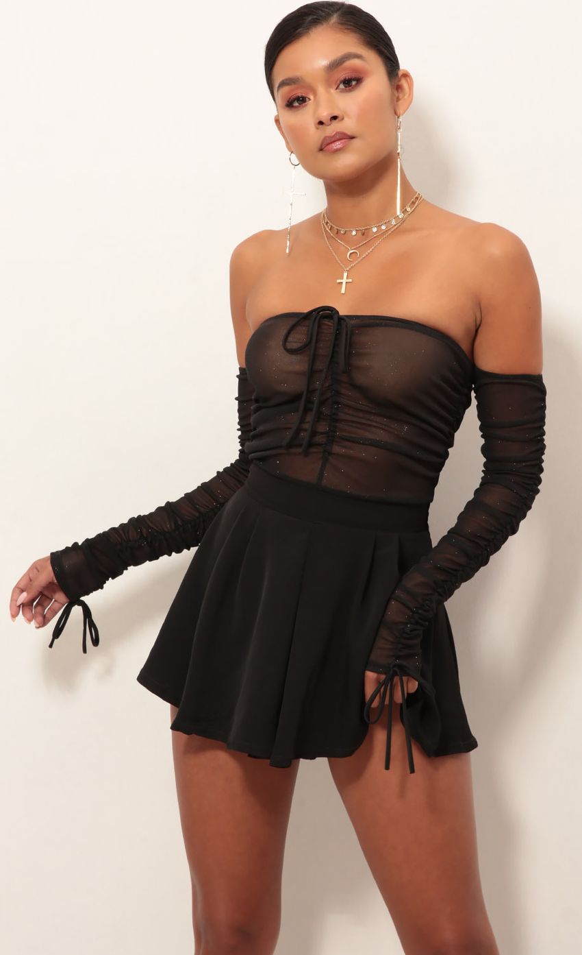 Picture Gala Pleated Romper In Black Shimmer. Source: https://media-img.lucyinthesky.com/data/Jan19_2/850xAUTO/0Y5A4305S.JPG