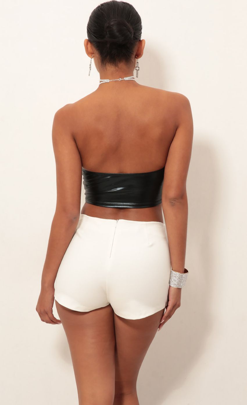 Picture Asymmetric Skort in Ivory. Source: https://media-img.lucyinthesky.com/data/Jan19_2/850xAUTO/0Y5A5070.JPG