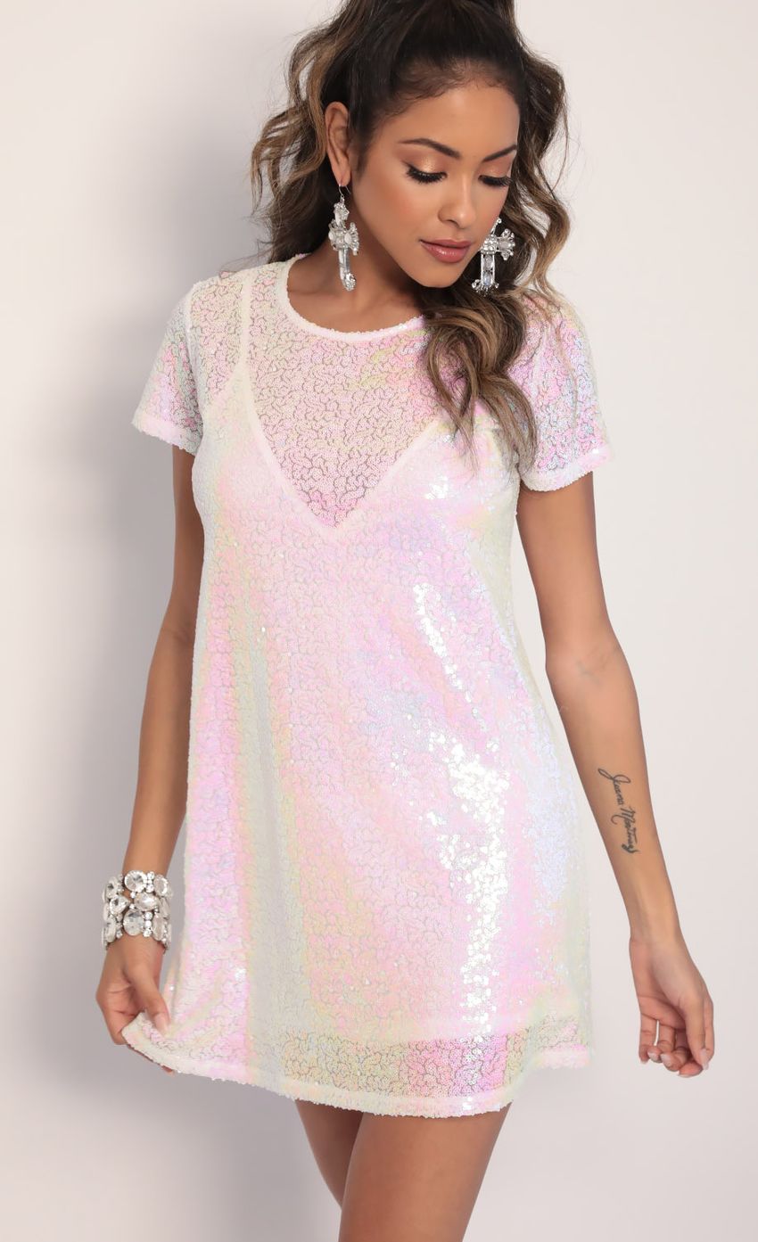 Picture Sequin Shift Dress in White Iridescence. Source: https://media-img.lucyinthesky.com/data/Jan20_1/850xAUTO/781A0200.JPG