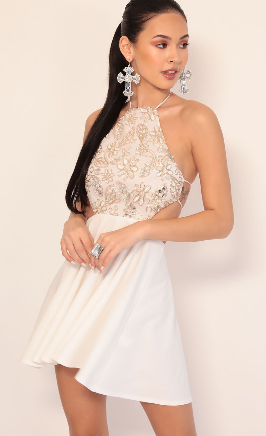 Picture Priya Sequin Lace Halter Dress in Ivory Gold. Source: https://media-img.lucyinthesky.com/data/Jan20_1/850xAUTO/781A1350.JPG
