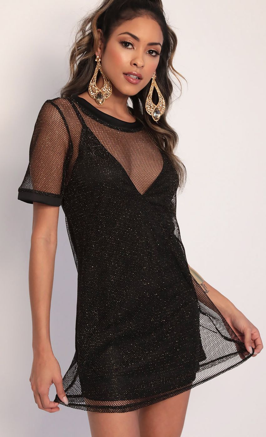 Picture Sparkling Gold Shift Dress in Black. Source: https://media-img.lucyinthesky.com/data/Jan20_2/850xAUTO/781A1774.JPG