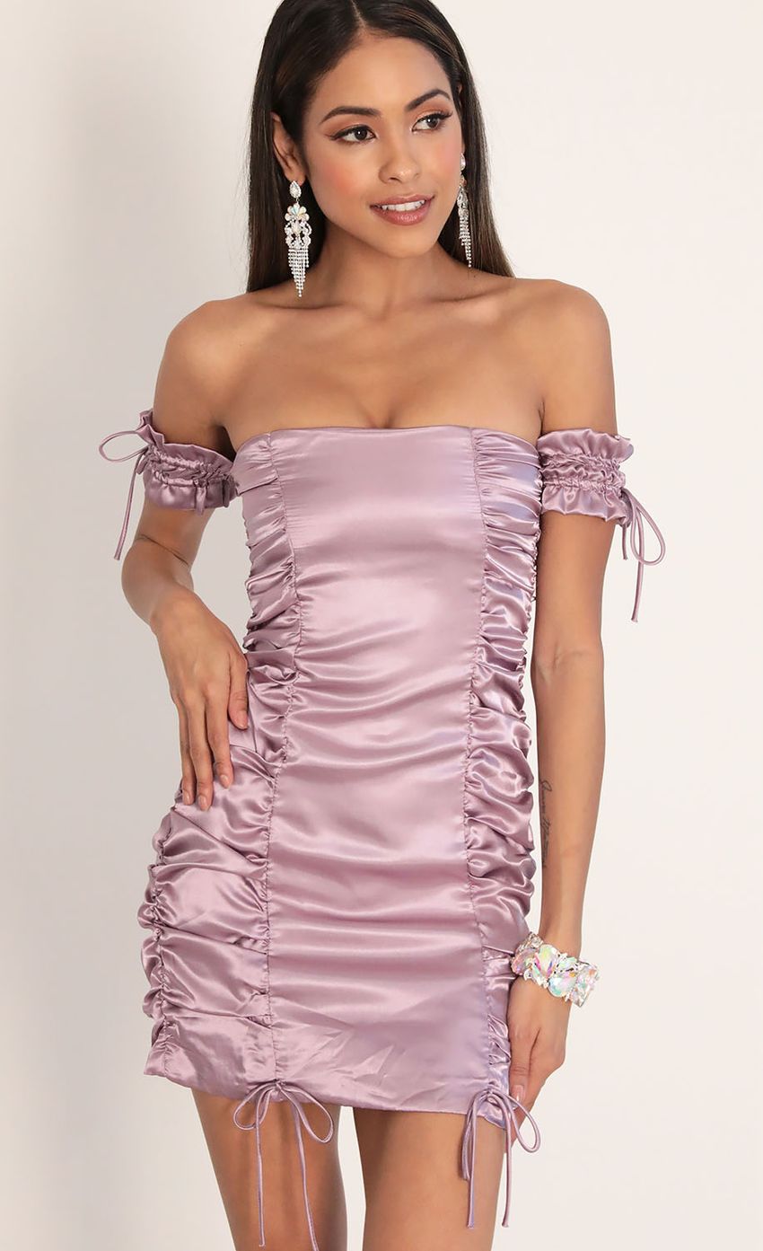 Picture Elaina Satin Mini Puff Dress in Dusty Lilac. Source: https://media-img.lucyinthesky.com/data/Jan20_2/850xAUTO/781A5025.JPG