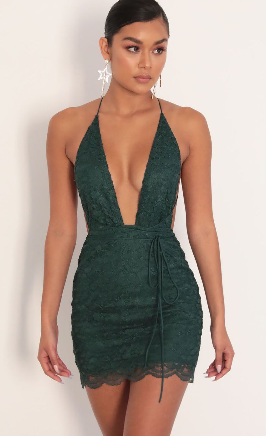 Picture Azlin Plunge Lace Dress in Hunter Green. Source: https://media-img.lucyinthesky.com/data/Jan20_2/850xAUTO/781A7488.JPG