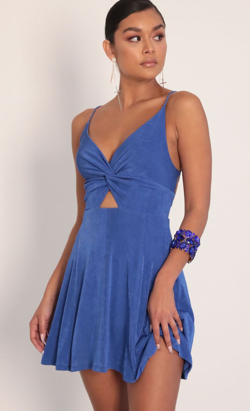 Picture Front Twist Dress in Royal Blue. Source: https://media-img.lucyinthesky.com/data/Jan20_2/850xAUTO/781A8089.JPG