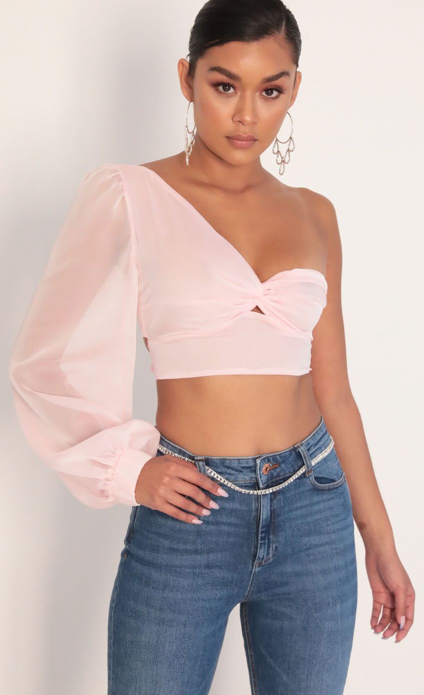 Picture Jasmine Puff Sleeve Chiffon Top in Pink. Source: https://media-img.lucyinthesky.com/data/Jan20_2/850xAUTO/781A8633.JPG