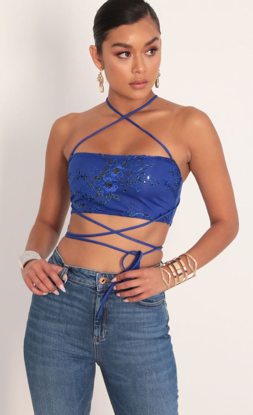 Picture Sequin Lace Top in Royal Blue. Source: https://media-img.lucyinthesky.com/data/Jan20_2/850xAUTO/781A8833.JPG