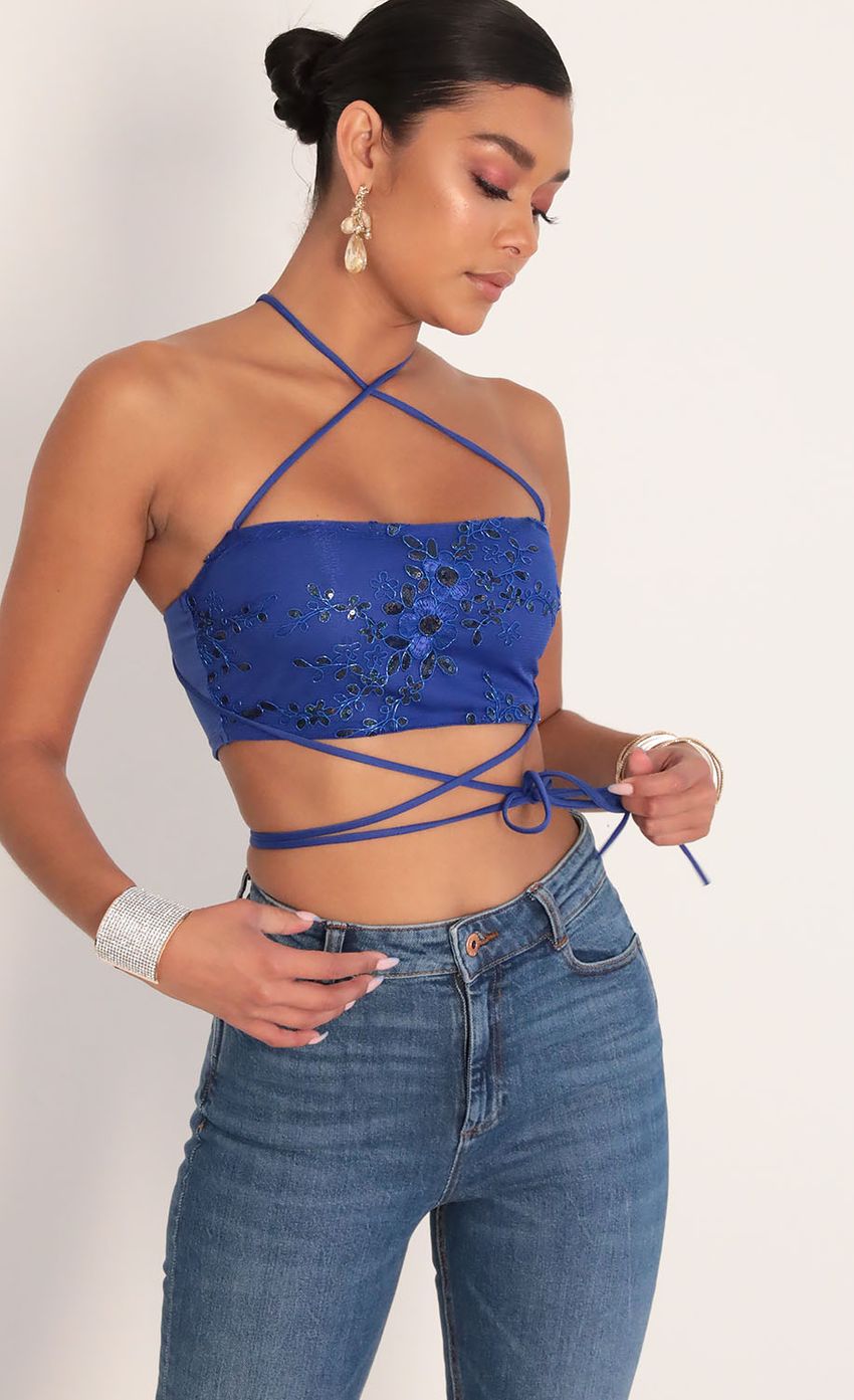 Picture Sequin Lace Top in Royal Blue. Source: https://media-img.lucyinthesky.com/data/Jan20_2/850xAUTO/781A8835.JPG