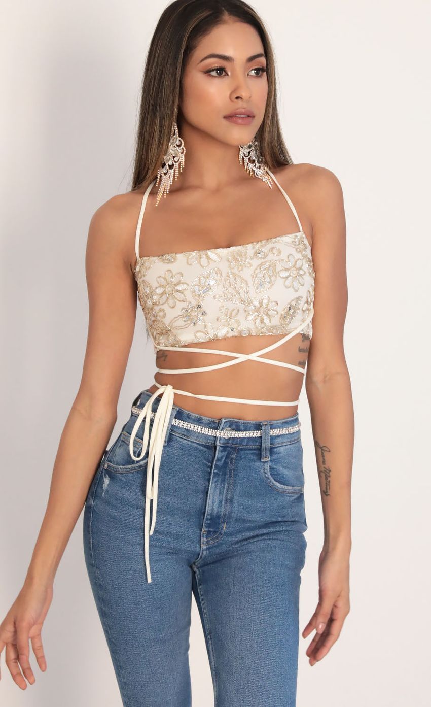 Picture Jana Sequin Lace Top in Ivory Gold. Source: https://media-img.lucyinthesky.com/data/Jan20_2/850xAUTO/781A9438.JPG