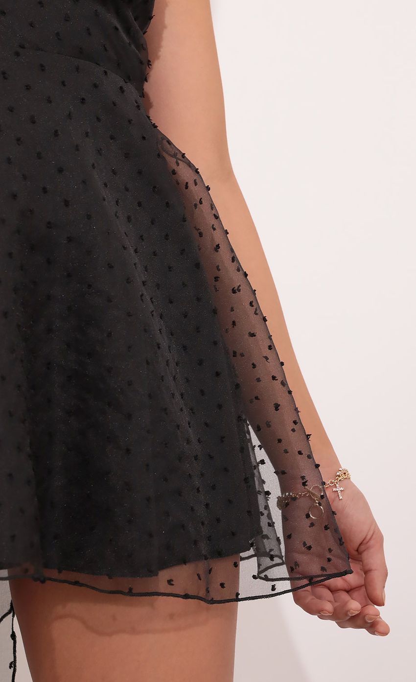 Picture Chiffon Halter Dress in Black. Source: https://media-img.lucyinthesky.com/data/Jan21_1/850xAUTO/1V9A1389.JPG