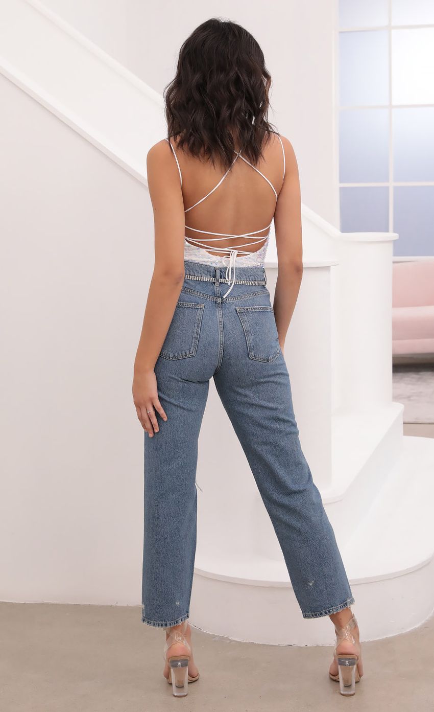 Picture Strappy Back Bodysuit in Iridescent White. Source: https://media-img.lucyinthesky.com/data/Jan21_1/850xAUTO/1V9A5670.JPG