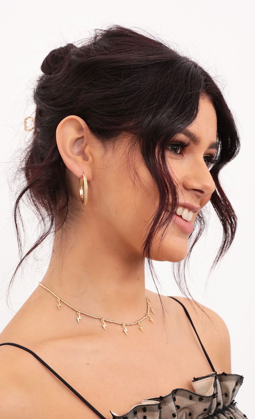 Picture Goddess Hoops in Gold. Source: https://media-img.lucyinthesky.com/data/Jan21_2/850xAUTO/1V9A1172_COPY.JPG