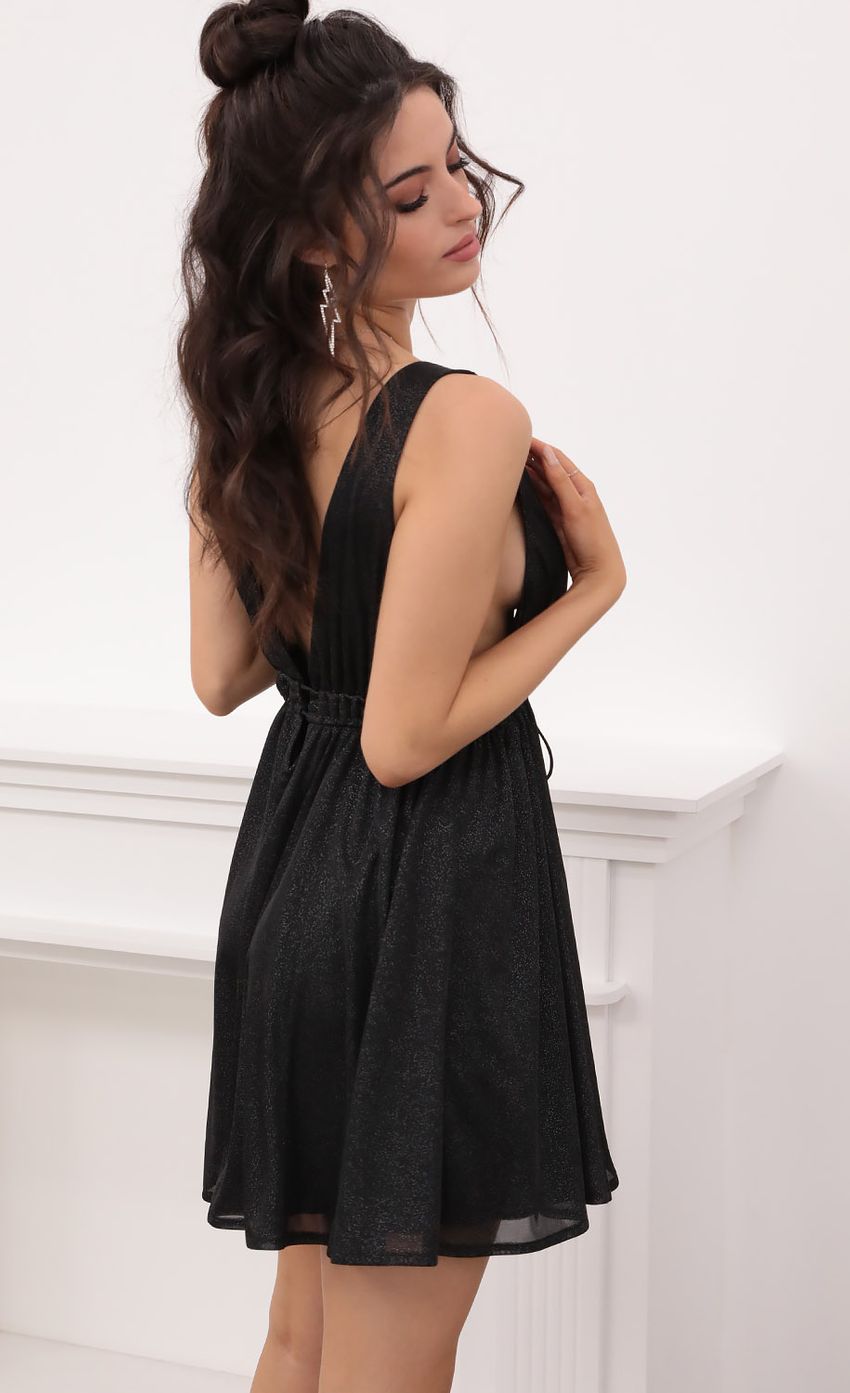 Picture Svana Plunge A-line Dress in Black Crystal. Source: https://media-img.lucyinthesky.com/data/Jan21_2/850xAUTO/1V9A5468.JPG