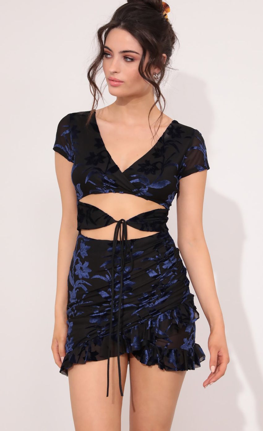 Picture Tie Cutout Ruffle and Ruched Dress in Navy Burnout. Source: https://media-img.lucyinthesky.com/data/Jan21_2/850xAUTO/1V9A9921.JPG