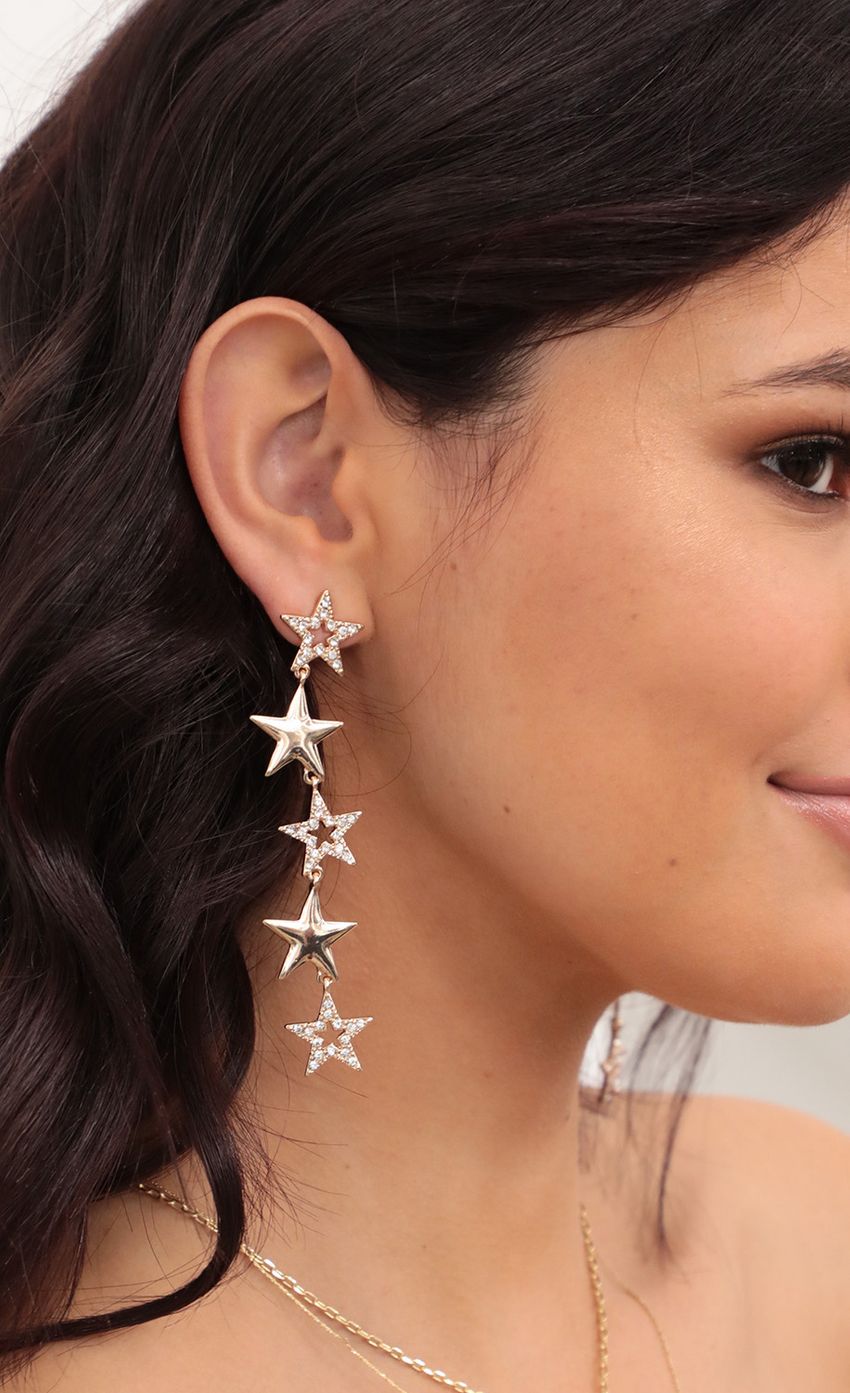 Picture Time to Shine Star Earrings in Rose Gold. Source: https://media-img.lucyinthesky.com/data/Jan21_2/850xAUTO/AT2A08481.JPG